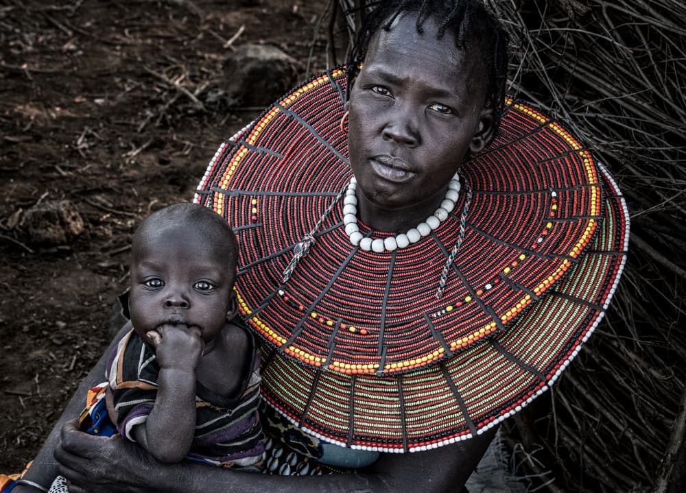 African Beaded Mother Child by Joxe Inazio Kuesta Garmendia — canvas wall art
