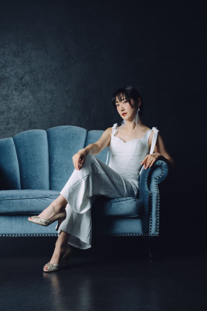 Confident Woman On Sofa by h112o1 — canvas wall art