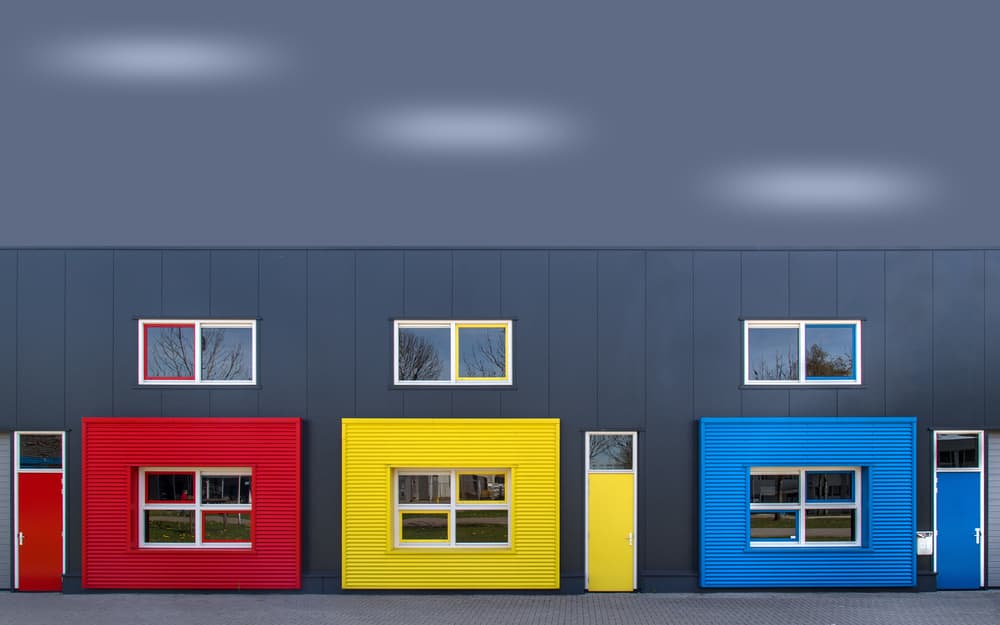 Colorful Geometric Facade by Theo Luycx — canvas wall art