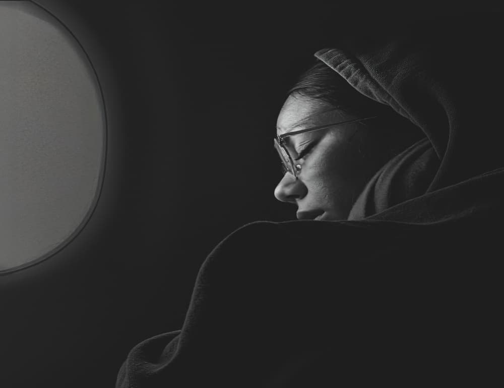 Hooded Woman Deep In Thought by Molly Fu APA — canvas wall art