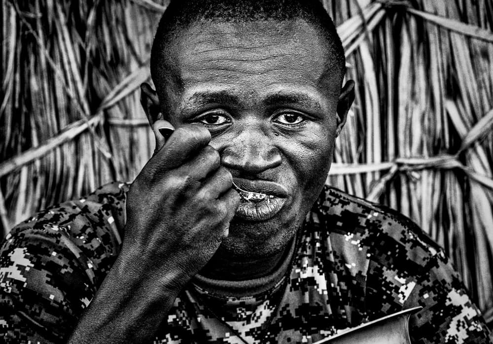 Focused Man Eating by Joxe Inazio Kuesta Garmendia — canvas wall art