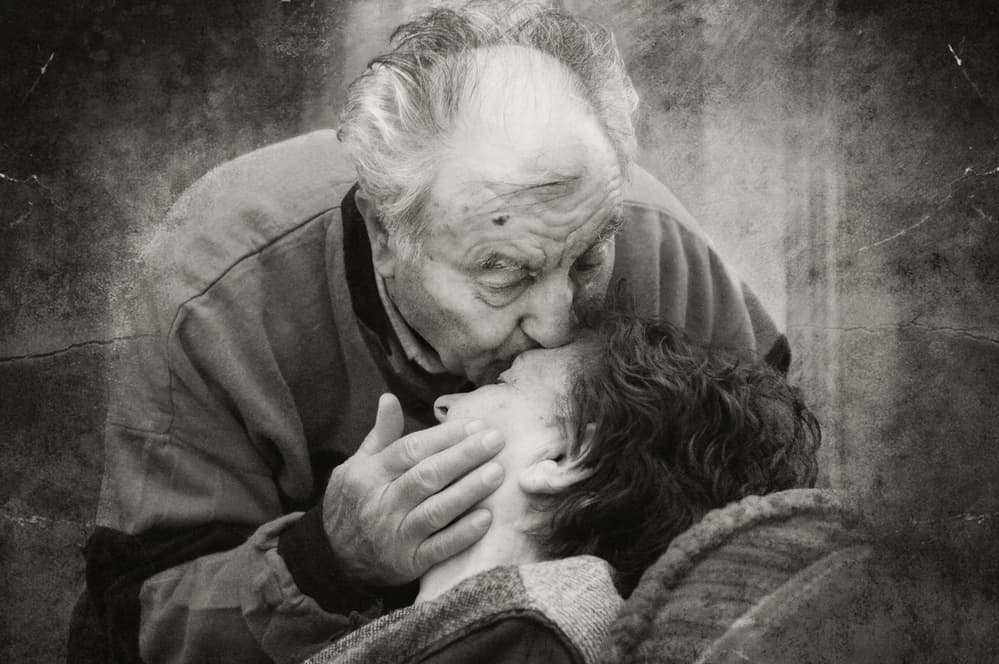 Tender Grandparent's Kiss by Nicoleta Gabor — canvas wall art
