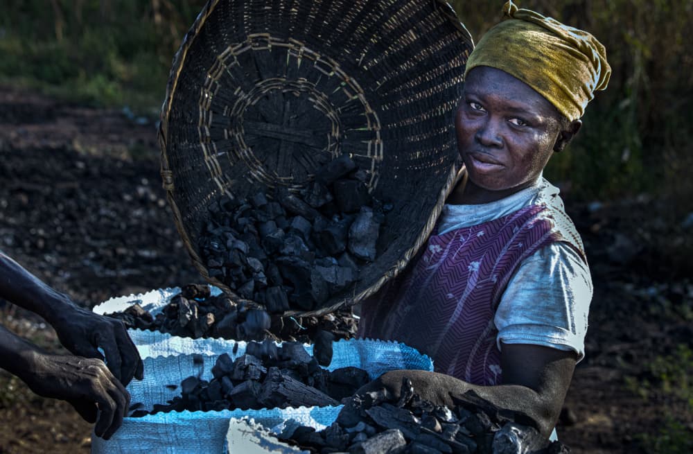 Woman Sifting Charcoal by Joxe Inazio Kuesta Garmendia — canvas wall art