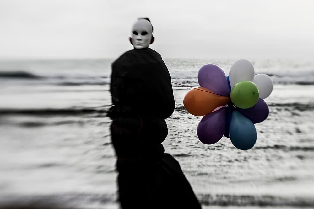 Masked Figure Bright Balloons by Bogdan Bouşcă — canvas wall art