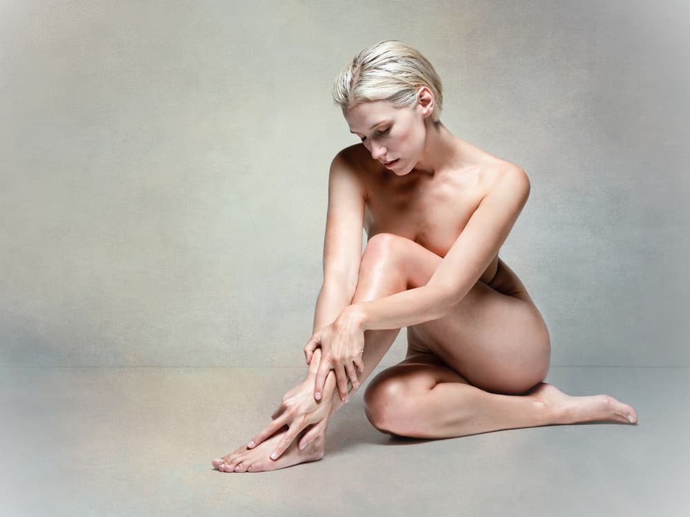 Contemplative Nude Figure by Luc Stalmans — canvas wall art