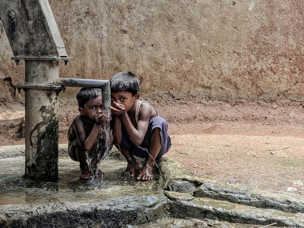 Thirsty Village Boys by Debarshi Mukherjee — canvas wall art