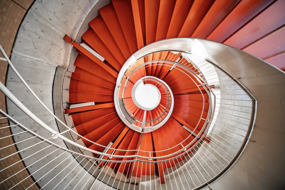 Orange Spiral Staircase by Tomoshi Hara — canvas wall art