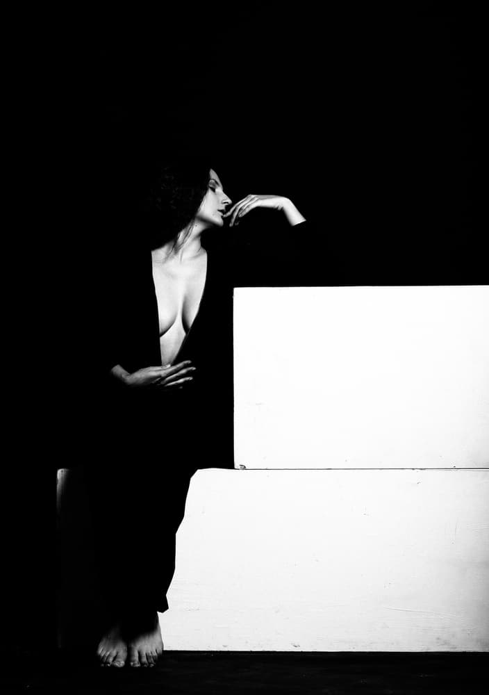 Pensive Woman in Shadow by Artem Vasilenko — canvas wall art