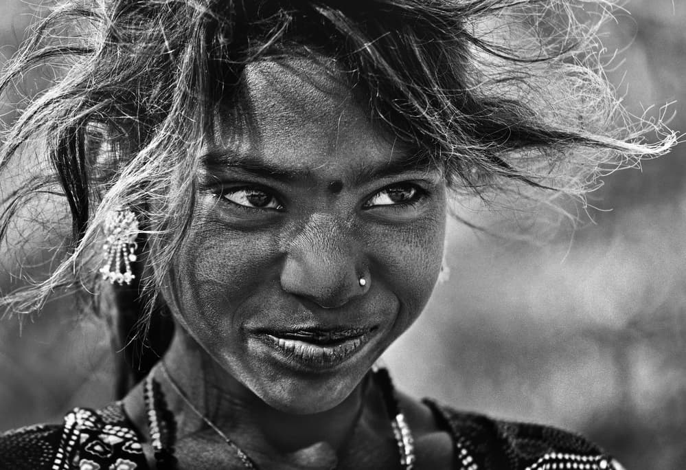 Smiling Indian Girl by Lou Urlings — canvas wall art