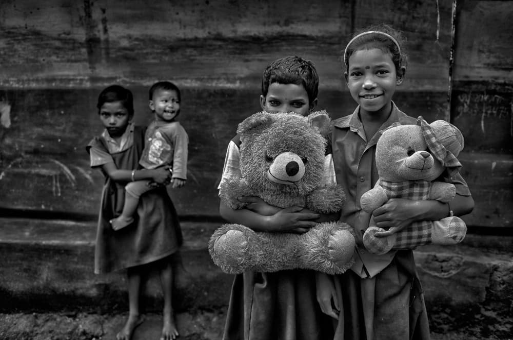 Smiling Girls And Teddy Bears by Avishek Das — canvas wall art