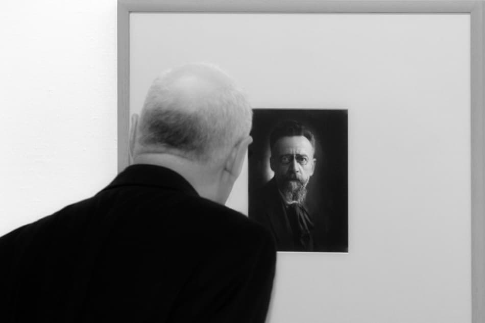 Man Reflects on Portrait by Jure Kravanja — canvas wall art