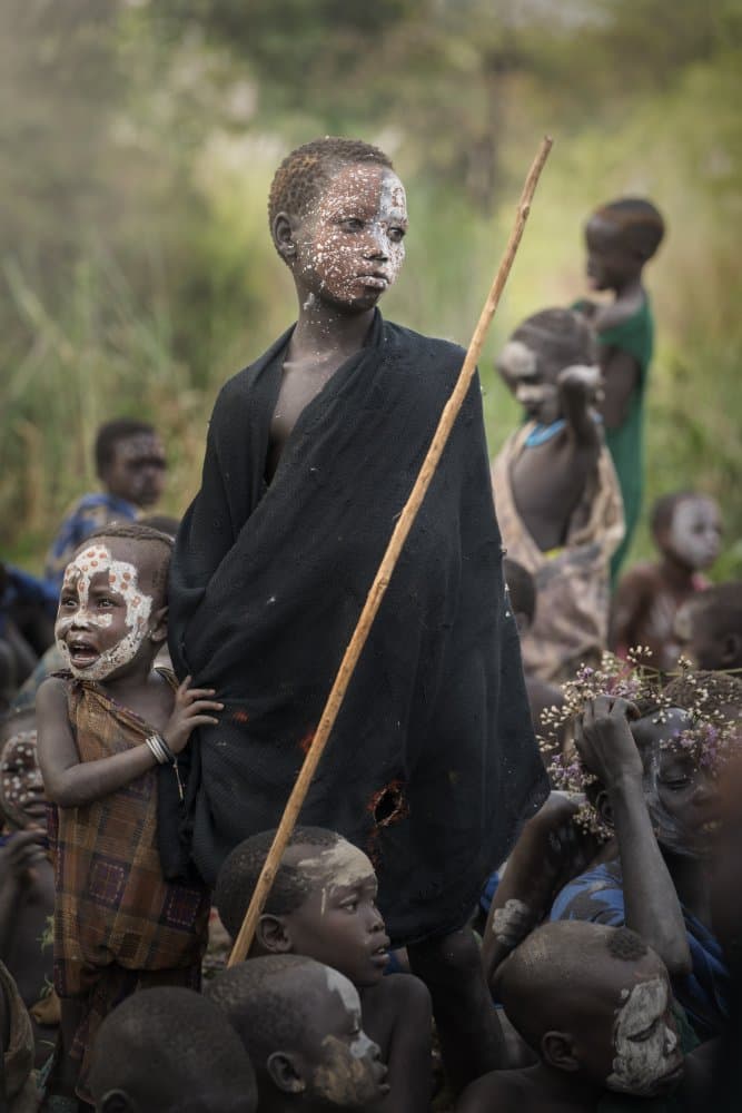 Pensive Tribal Boy by Sarawut Intarob — canvas wall art