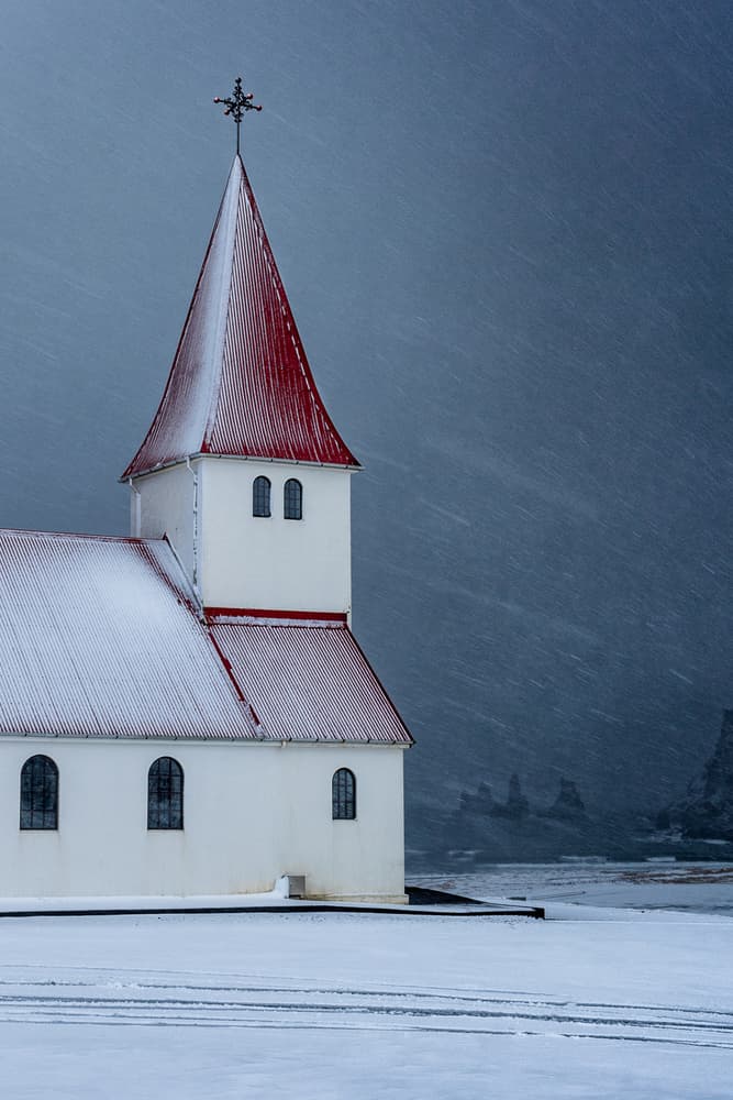 Icelandic Winter Church by Marc Pelissier — canvas wall art