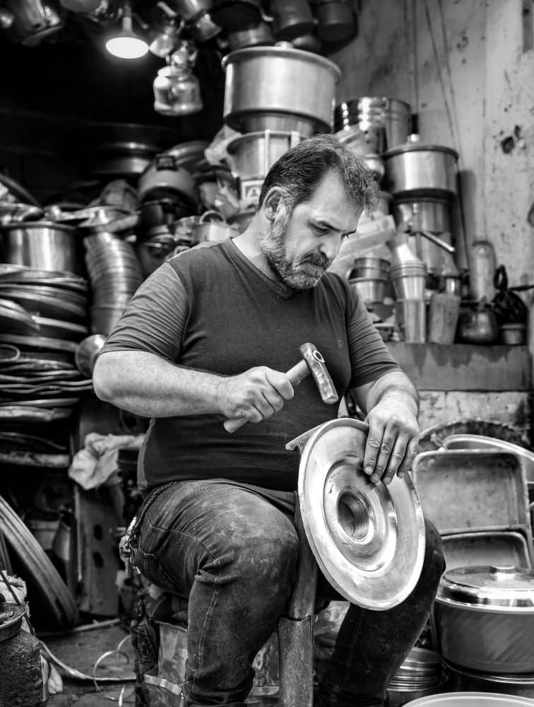 Artisan Metal Worker by Bashar Alsofey — canvas wall art