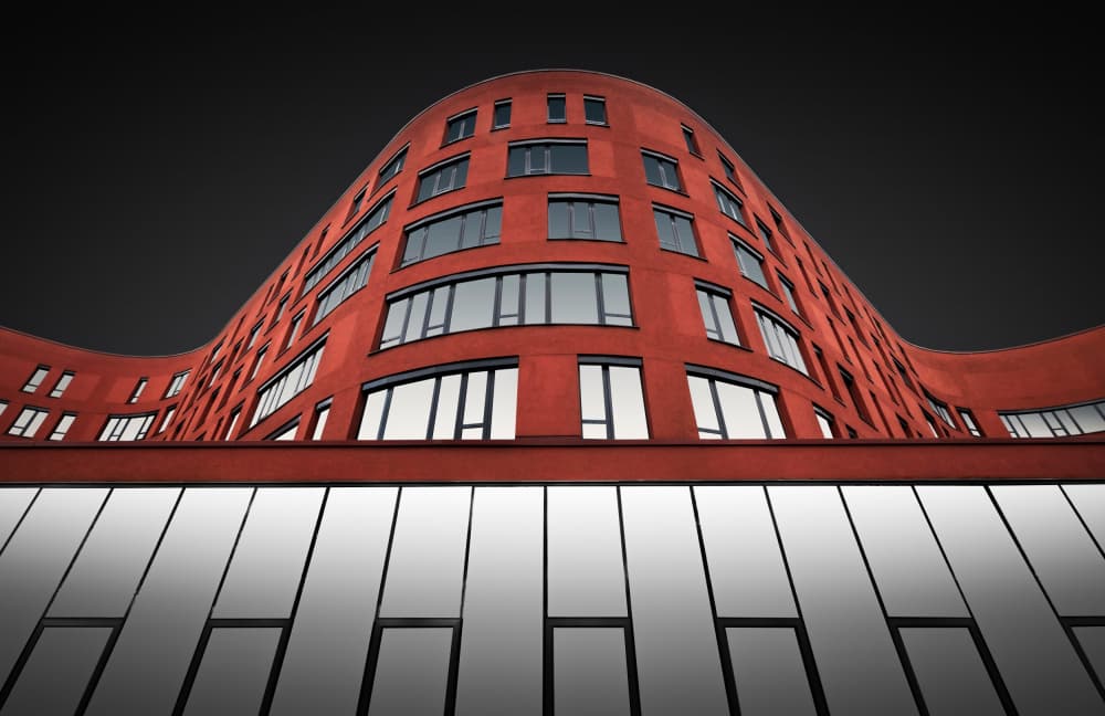 Curved Red Architecture by Roland M Schwerdtfeger — canvas wall art
