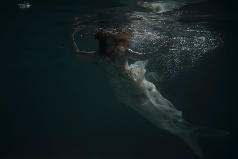 Ethereal Underwater Swimmer by Olga Barantseva — canvas wall art