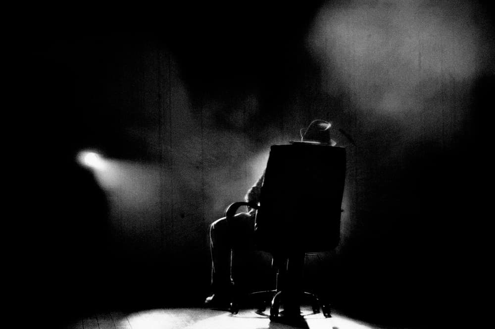 Mysterious Man in Spotlight by Milena Seita — canvas wall art
