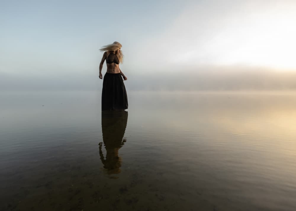 Woman In Misty Reflection by Leszek Paradowski — canvas wall art