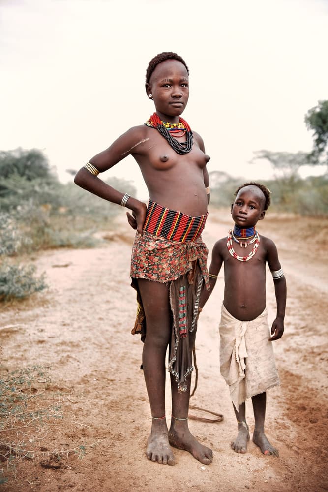 African Siblings Portrait by Trevor Cole — canvas wall art