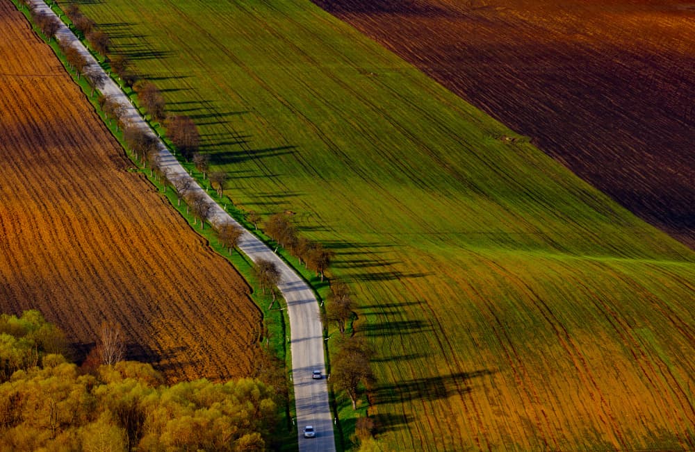 Winding Road Through Fields by Peter Hrabinsky — canvas wall art