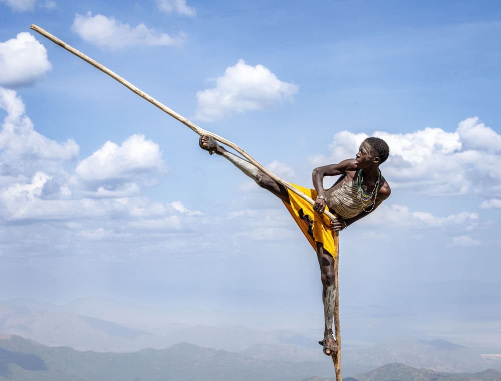 African Stilt Dance by Hamza Qarooni — canvas wall art