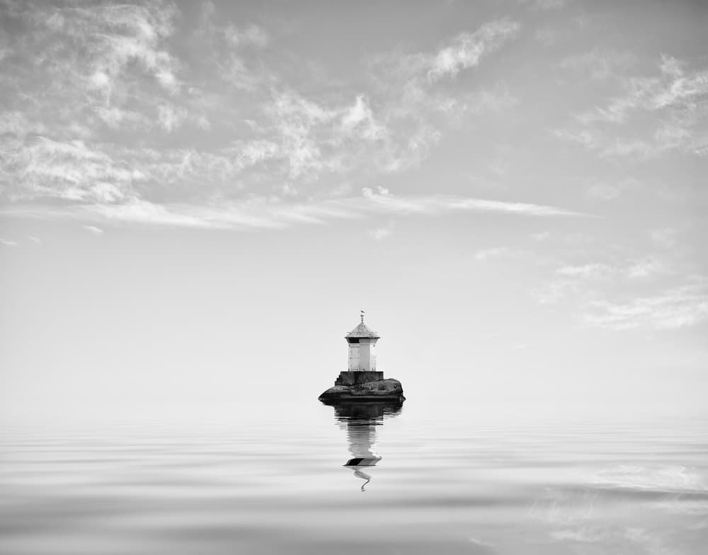 Solitary Lighthouse Reflection by Christian Lindsten — canvas wall art