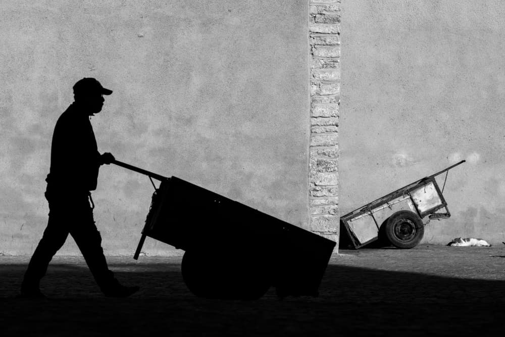 Street Worker Silhouette by Dan Mirica — canvas wall art