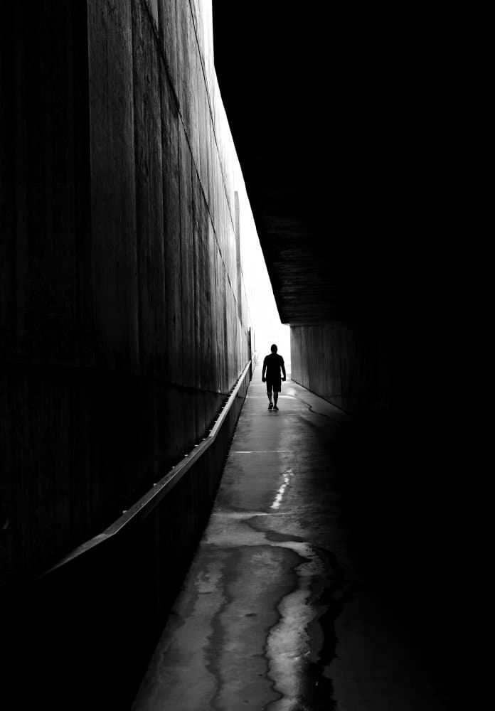 Man Walking Towards Light by Ezequiel59 — canvas wall art