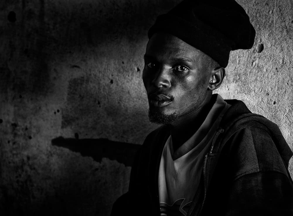 Moody Urban Portrait by Joxe Inazio Kuesta Garmendia — canvas wall art