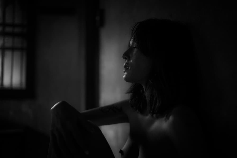 Pensive Woman's Profile by Thanakorn Chai Telan — canvas wall art