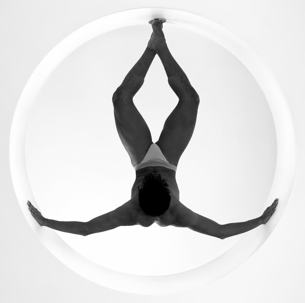 Suspended Man In Circle by Alexandr — canvas wall art