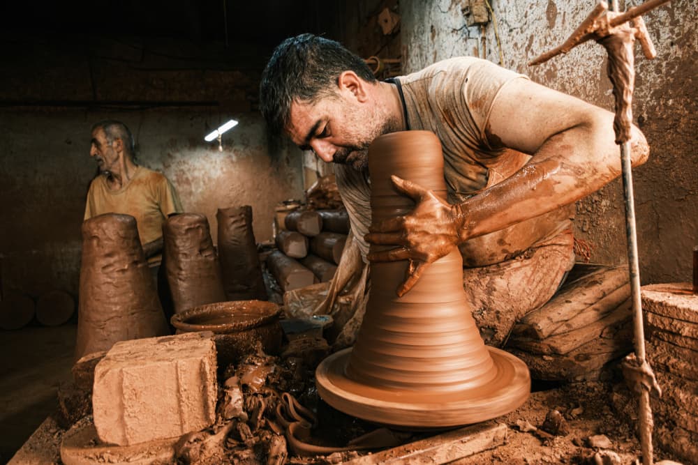 Artisan at Wheel by Ali Ayer — canvas wall art