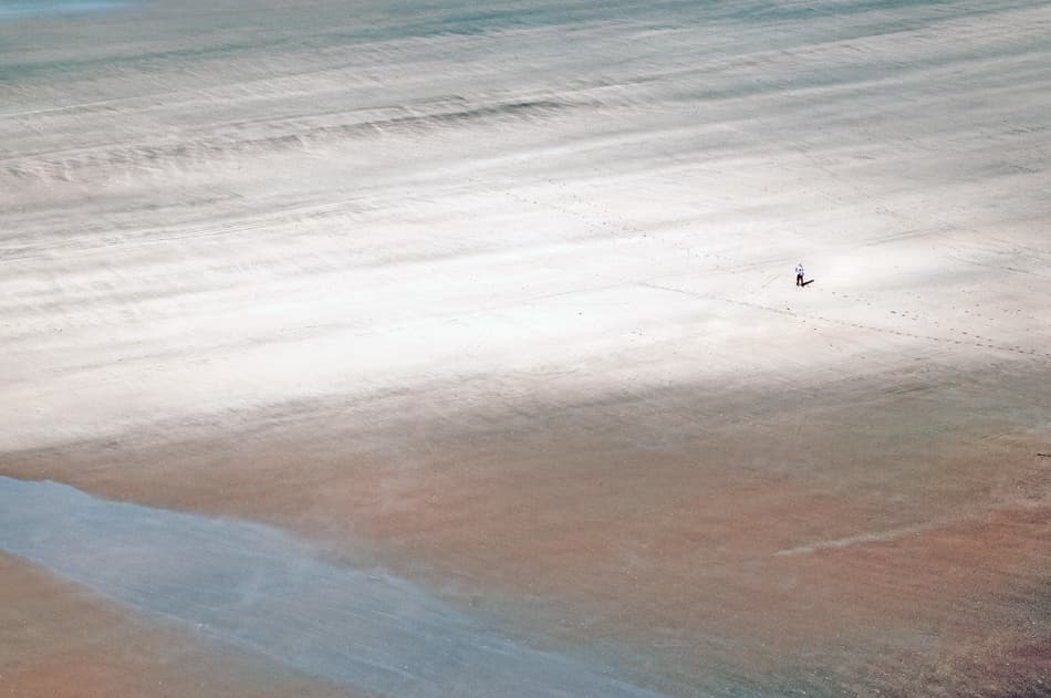 Solitary Walk On Vast Beach by Linda Wride — canvas wall art