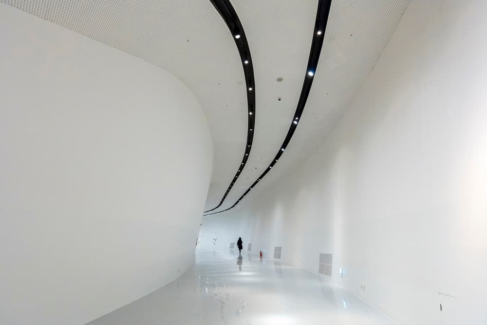 Curved White Hallway by Shin Woo Ryu — canvas wall art