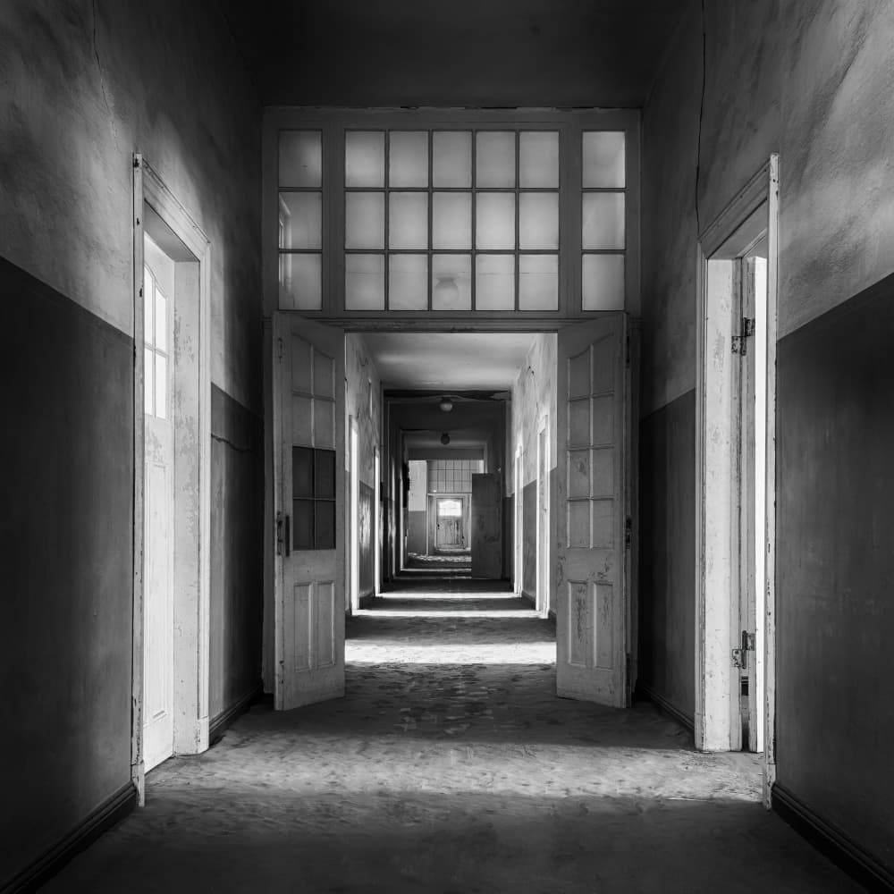 Abandoned Hallway Light by Marc van Oostrum — canvas wall art