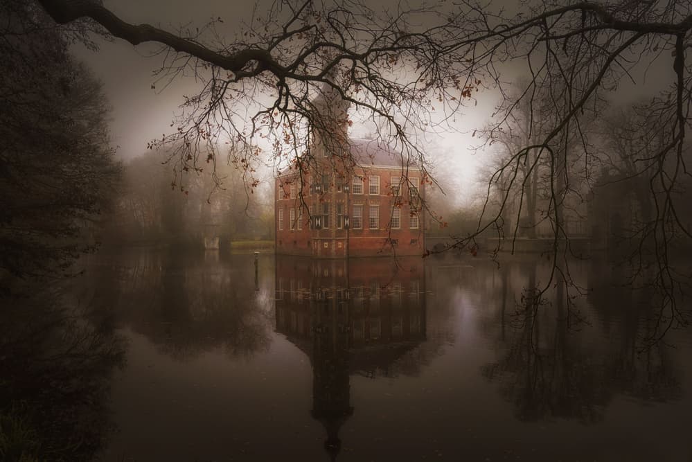 Misty Castle Reflection by Saskia Dingemans — canvas wall art