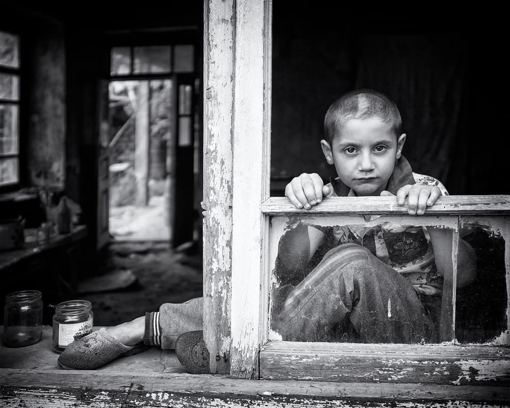 Boy In Broken Window by Marcel Rebro — canvas wall art