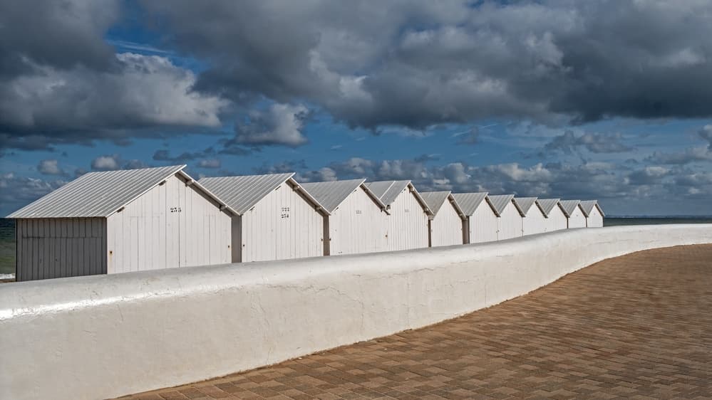 Dramatic Coastal Huts by Lus Joosten — canvas wall art