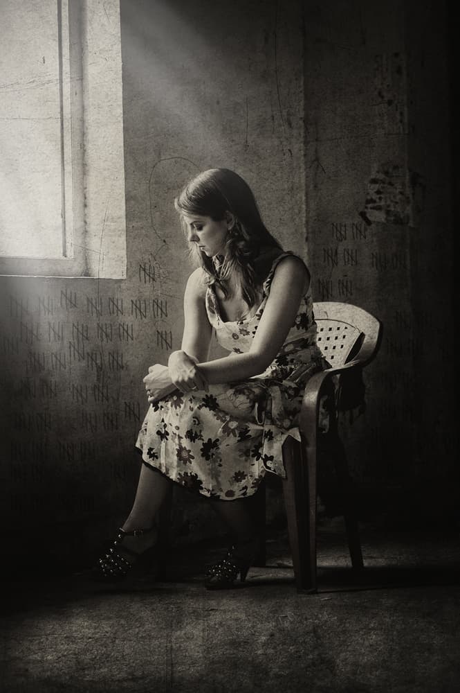 Pensive Woman Window Light by Hari Sulistiawan — canvas wall art