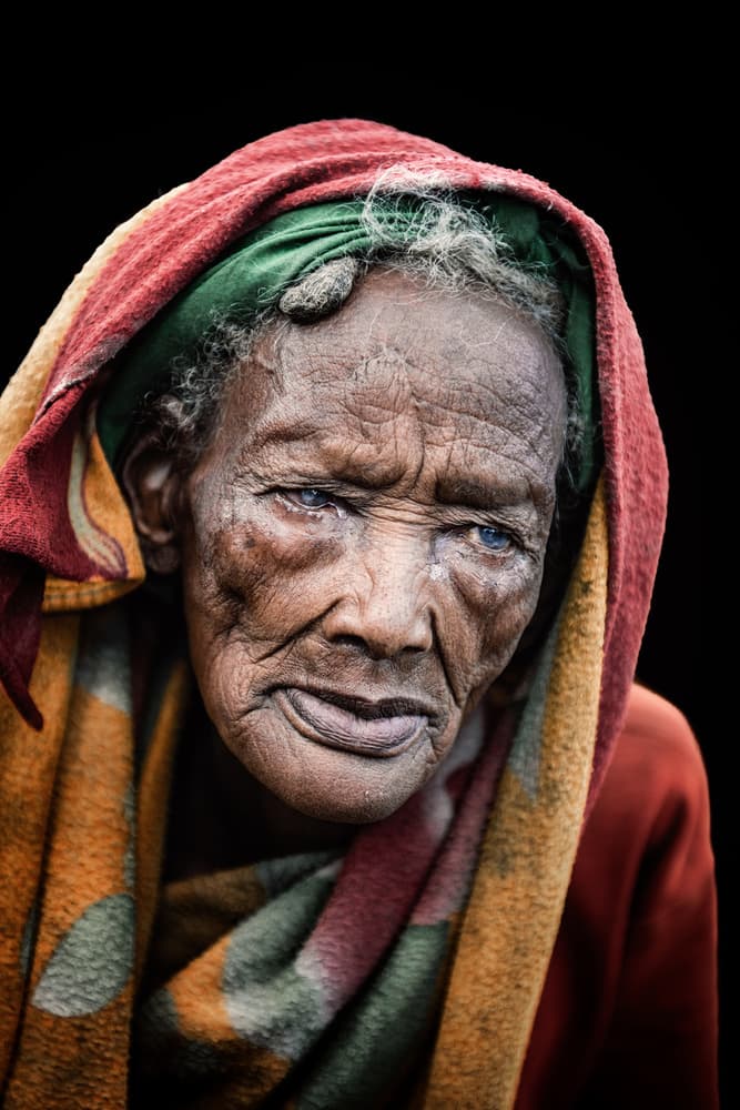 Elder Woman Blue Eyes by Trevor Cole — canvas wall art