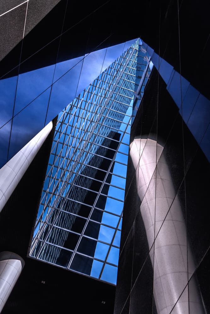 Blue Skyscraper Reflections by Theo Luycx — canvas wall art