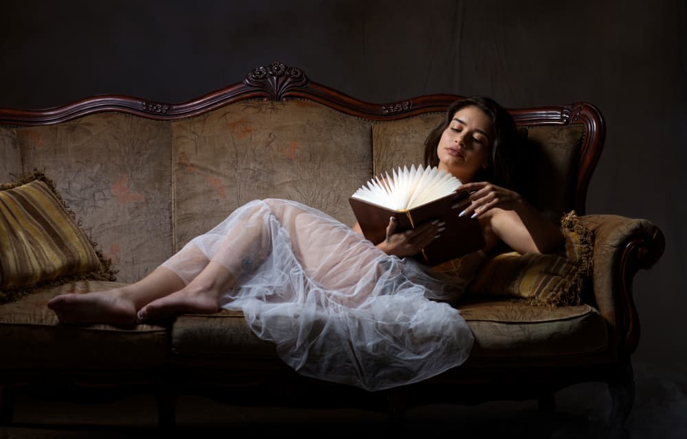 Woman with Glowing Book by Offer Ellbogen — canvas wall art