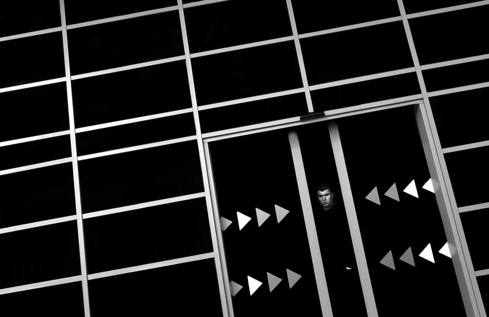 Man in Abstract Grid by Anna Niemiec — canvas wall art