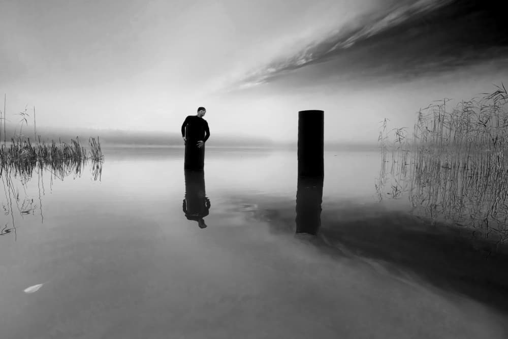 Man in Still Water by Leszek Paradowski — canvas wall art