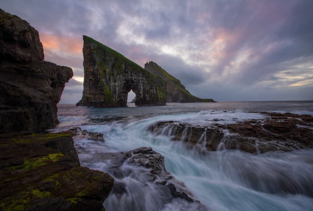 Dramatic Faroe Coastal Arch by April Xie — canvas wall art