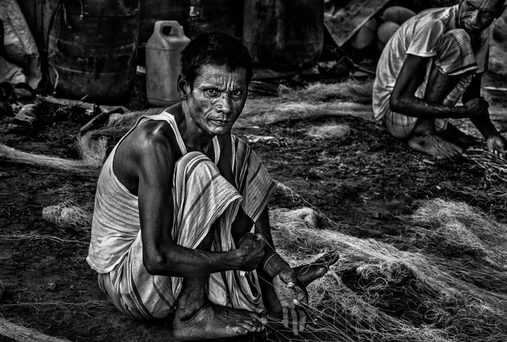 Fisherman's Intent Gaze by Joxe Inazio Kuesta Garmendia — canvas wall art