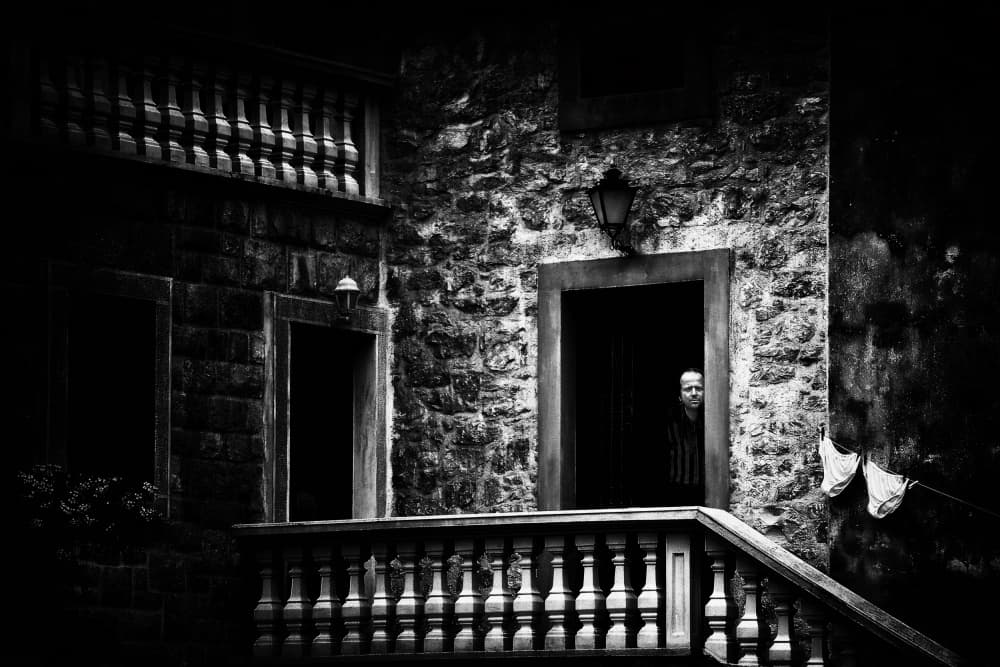 Man In Dark Doorway by Samanta Krivec — canvas wall art