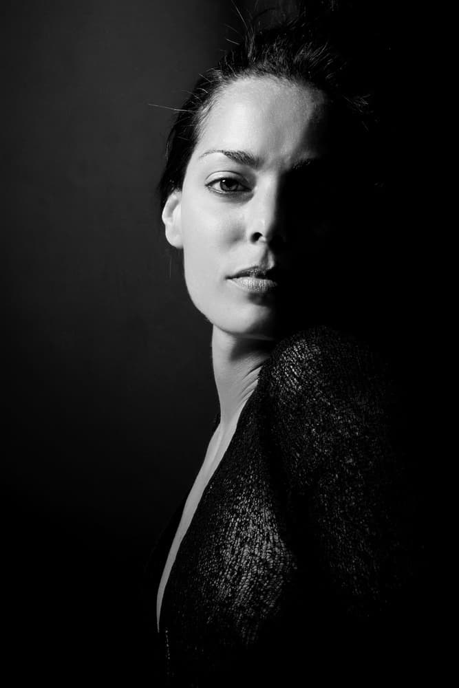 Elegant Shadowed Gaze by Olga Mest — canvas wall art
