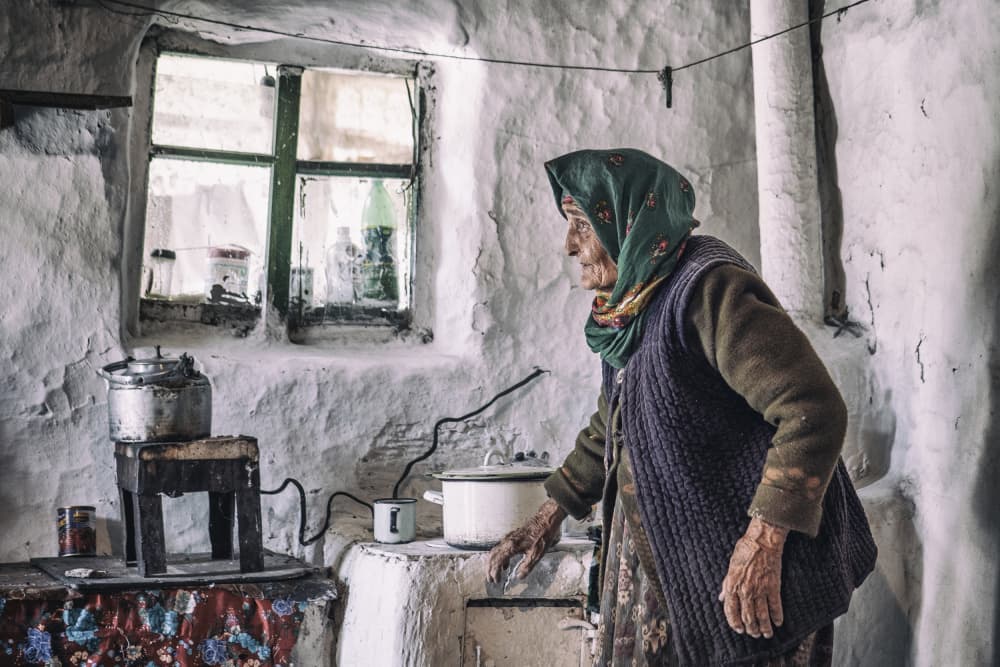 Elderly Woman's Kitchen by Marcel Rebro — canvas wall art