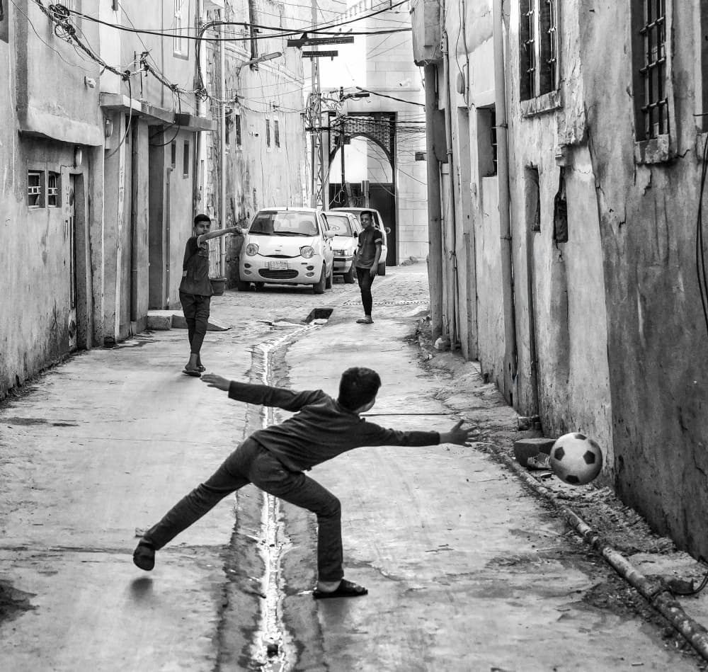 Street Soccer Save by Bashar Alsofey — canvas wall art